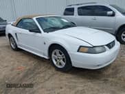 ✅ 2004 Ford Mustang Deluxe • VIN: 1FAFP44644F193077 • Lot: 42455984. Listed on IAAI with 138,265 mi. Free auction sales archive from the USA and detailed vehicle history report at DreamBid. Image 1.