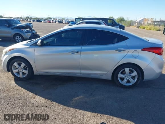 ✅ 2013 Hyundai Elantra GLS • VIN: KMHDH4AE0DU533455 • Lot: 43471630. Listed on IAAI with 71,362 mi. Free auction sales archive from the USA and detailed vehicle history report at DreamBid. Image 14.