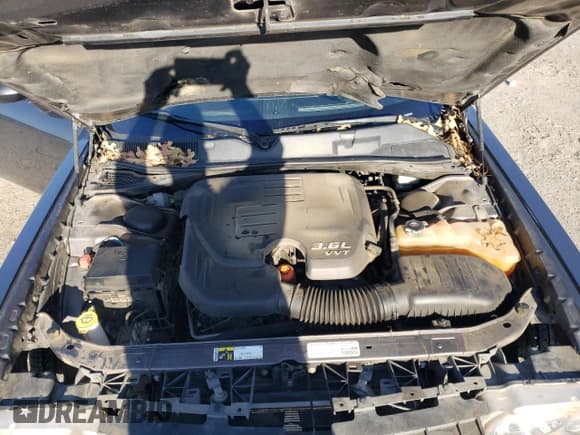 ✅ 2014 Dodge Challenger SXT • VIN: 2C3CDYAG5EH307375 • Lot: 82178604. Wystawiony na Copart z przebiegiem 140 376 mil. Bezpłatny archiwum sprzedaży aukcyjnych z USA i szczegółowy raport historii pojazdu na DreamBid. Zdjęcie 11.