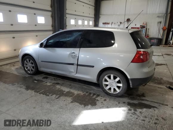 ✅ 2009 Volkswagen Rabbit S • VIN: WVWBB71K29W003438 • Lot: 46041015. Listed on Copart with 128,351 mi. Free auction sales archive from the USA and detailed vehicle history report at DreamBid. Image 2.