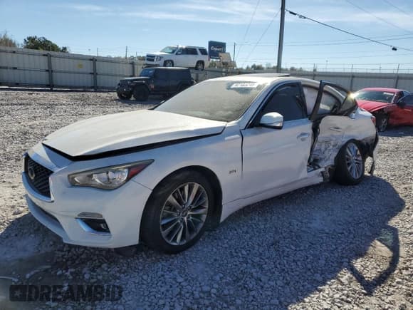 ✅ 2018 Infiniti Q50 Luxe • VIN: JN1EV7AP9JM352857 • Лот: 92103245. Опубликован ранее на Copart с пробегом 128 325 миль. Бесплатный доступ к архиву аукционных продаж из США и подробный отчёт об истории автомобиля на DreamBid. Изображение 1.