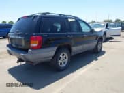 ✅ 2001 Jeep Grand Cherokee Laredo • VIN: 1J4GW48S31C579926 • Lot: 42331094. Listed on IAAI with Not provided. Free auction sales archive from the USA and detailed vehicle history report at DreamBid. Image 4.