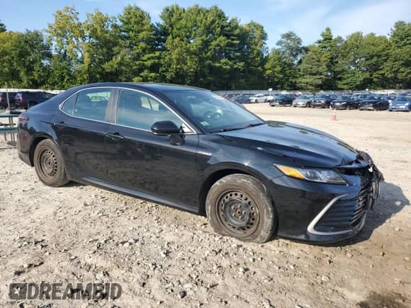 2021 Toyota Camry Hybrid LE with VIN 4T1C31AK1MU554667, listed as a Copart auction lot 72074985 with 214,321 mi miles and Salvage title. Bid and sale history available at DreamBid. Image 4.