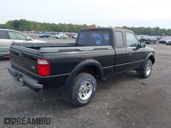 ✅ 2001 Ford Ranger XL • VIN: 1FTYR14UX1TA19831 • Lot: 43310748. Wystawiony na IAAI z przebiegiem 156 803 mil. Bezpłatny archiwum sprzedaży aukcyjnych z USA i szczegółowy raport historii pojazdu na DreamBid. Zdjęcie 4.