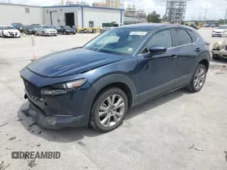 ✅ 2021 Mazda CX-30 Select • VIN: 3MVDMABL8MM305105 • Lot: 62401434. Wystawiony na Copart z przebiegiem 79 776 mil. Bezpłatny archiwum sprzedaży aukcyjnych z USA i szczegółowy raport historii pojazdu na DreamBid. Zdjęcie 1.