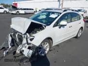 ✅ 2012 Subaru Impreza Premium • VIN: JF1GPAB61CH240431 • Lot: 43315187. Listed on IAAI with 76,218 mi. Free auction sales archive from the USA and detailed vehicle history report at DreamBid. Image 2.