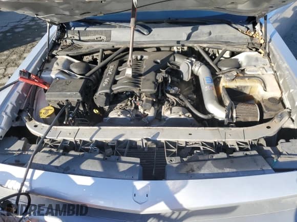 ✅ 2009 Dodge Challenger SE • VIN: 2B3LJ44VX9H522894 • Lot: 81184364. Wystawiony na Copart z przebiegiem 129 069 mil. Bezpłatny archiwum sprzedaży aukcyjnych z USA i szczegółowy raport historii pojazdu na DreamBid. Zdjęcie 11.