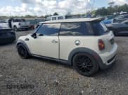 ✅ 2010 MINI Hardtop S • VIN: WMWMF7C5XATW89025 • Lot: 56106705. Listed on Copart with 141,216 mi. Free auction sales archive from the USA and detailed vehicle history report at DreamBid. Image 2.