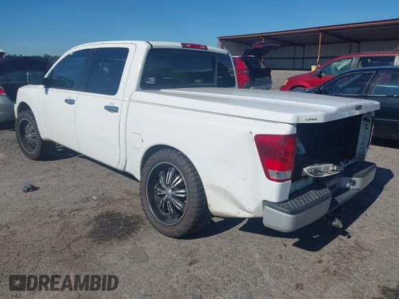 ✅ 2014 Nissan Titan SE • VIN: 1N6BA0EK1EN518044 • Лот: 42294912. Опубликован ранее на IAAI с пробегом 131 190 миль. Бесплатный доступ к архиву аукционных продаж из США и подробный отчёт об истории автомобиля на DreamBid. Изображение 3.