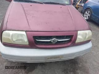 ✅ 2000 Suzuki Grand Vitara JLX • VIN: JS3TD62V7Y4119022 • Лот: 42384608. Опубликован ранее на IAAI с пробегом 153 943 миль. Бесплатный доступ к архиву аукционных продаж из США и подробный отчёт об истории автомобиля на DreamBid. Изображение 6.