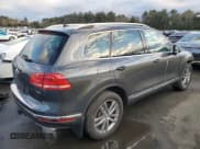 ✅ 2016 Volkswagen Touareg Lux • VIN: WVGEP9BP1GD007036 • Lot: 88735255. Listed on Copart with 82,063 mi. Free auction sales archive from the USA and detailed vehicle history report at DreamBid. Image 3.
