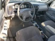 ✅ 2002 Toyota Tacoma PreRunner • VIN: 5TESN92N12Z105477 • Lot: 92028695. Listed on Copart with 284,953 mi. Free auction sales archive from the USA and detailed vehicle history report at DreamBid. Image 8.