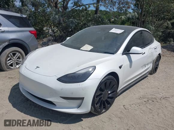 ✅ 2022 Tesla Model 3 Performance • VIN: 5YJ3E1ECXNF263791 • Лот: 43083174. Опубликован ранее на IAAI с пробегом 47 467 миль. Бесплатный доступ к архиву аукционных продаж из США и подробный отчёт об истории автомобиля на DreamBid. Изображение 2.