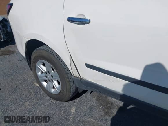 2013 Chevrolet Traverse LS with VIN 1GNKRFED5DJ184307, listed as a IAAI auction lot 43089060 with 106,499 mi miles and . Bid and sale history available at DreamBid. Image 6.