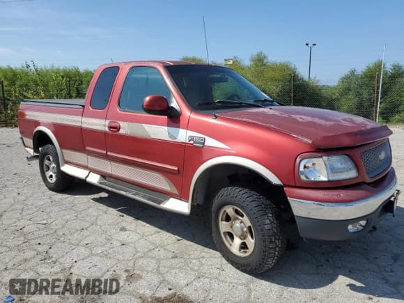 ✅ 1999 Ford F-150 • VIN: 1FTRX18W8XKB18488 • Lot: 71613565. Wystawiony na Copart z przebiegiem Nie podano. Bezpłatny archiwum sprzedaży aukcyjnych z USA i szczegółowy raport historii pojazdu na DreamBid. Zdjęcie 4.