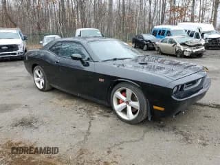 ✅ 2012 Dodge Challenger SRT-8 392 • VIN: 2C3CDYCJ4CH217379 • Lot: 85422154. Wystawiony na Copart z przebiegiem 65 836 mil. Bezpłatny archiwum sprzedaży aukcyjnych z USA i szczegółowy raport historii pojazdu na DreamBid. Zdjęcie 4.
