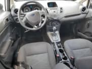 ✅ 2014 Ford Fiesta S • VIN: 3FADP4TJ9EM131799 • Lot: 62911165. Listed on Copart with 64,732 mi. Free auction sales archive from the USA and detailed vehicle history report at DreamBid. Image 8.