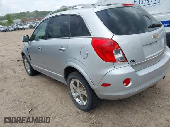 ✅ 2013 Chevrolet Captiva Sport LT • VIN: 3GNAL3EK5DS585249 • Lot: 42395833. Wystawiony na IAAI z przebiegiem 162 746 mil. Bezpłatny archiwum sprzedaży aukcyjnych z USA i szczegółowy raport historii pojazdu na DreamBid. Zdjęcie 3.