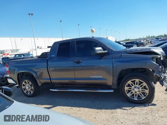✅ 2016 Toyota Tundra SR • VIN: 5TFRM5F19GX095457 • Lot: 43593252. Listed on IAAI with 206,354 mi. Free auction sales archive from the USA and detailed vehicle history report at DreamBid. Image 14.