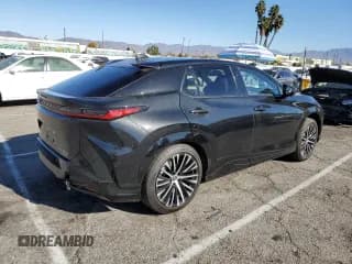 ✅ 2023 Lexus RZ 450e Premium • VIN: JTJAAAAB3PA013849 • Lot: 81664514. Wystawiony na Copart z przebiegiem 7 914 mil. Bezpłatny archiwum sprzedaży aukcyjnych z USA i szczegółowy raport historii pojazdu na DreamBid. Zdjęcie 3.