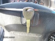 ✅ 2000 Honda Accord LX • VIN: 1HGCG3147YA004016 • Lot: 42280120. Listed on IAAI with 290,642 mi. Free auction sales archive from the USA and detailed vehicle history report at DreamBid. Image 11.