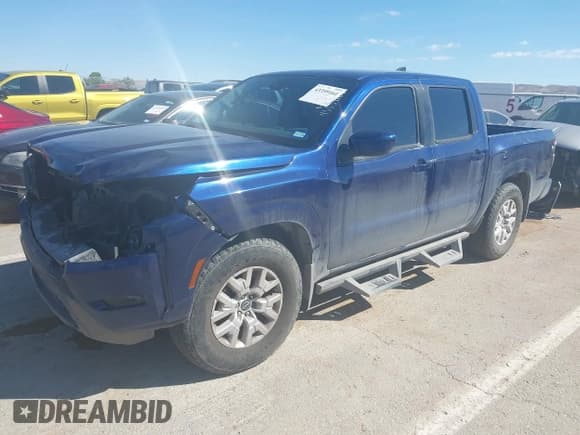 ✅ 2022 Nissan Frontier SV • VIN: 1N6ED1EJ9NN614831 • Lot: 43359164. Listed on IAAI with 88,879 mi. Free auction sales archive from the USA and detailed vehicle history report at DreamBid. Image 2.