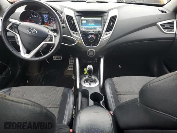 ✅ 2013 Hyundai Veloster w/Gray Int • VIN: KMHTC6AD4DU151247 • Lot: 77999554. Wystawiony na Copart z przebiegiem 169 409 mil. Bezpłatny archiwum sprzedaży aukcyjnych z USA i szczegółowy raport historii pojazdu na DreamBid. Zdjęcie 8.