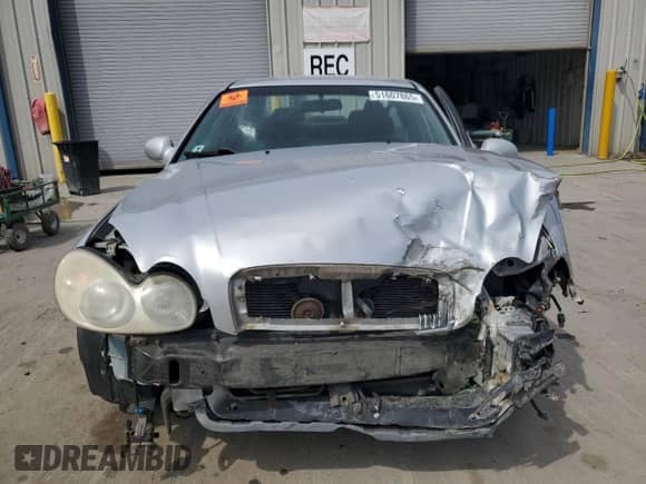 2004 Hyundai Sonata GLS z VIN KMHWF35H34A940619, wystawiony jako Copart lot #51607865 z przebiegiem 192 742 mil mil oraz Szkoda całkowita • Salvage title. Historia ofert i sprzedaży dostępna na DreamBid. Obrazek 5.