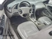 ✅ 2003 Ford Mustang Deluxe • VIN: 1FAFP44483F419943 • Lot: 94193385. Listed on Copart with 265,845 mi. Free auction sales archive from the USA and detailed vehicle history report at DreamBid. Image 8.