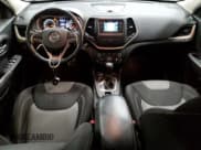 ✅ 2014 Jeep Cherokee Latitude • VIN: 1C4PJMCS0EW294973 • Lot: 93135185. Listed on Copart with 125,392 mi. Free auction sales archive from the USA and detailed vehicle history report at DreamBid. Image 8.