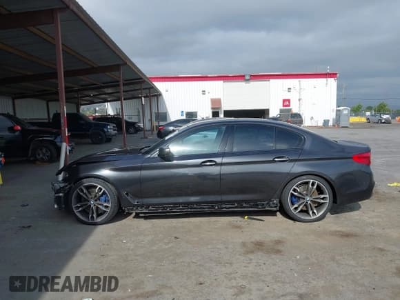 ✅ 2018 BMW 5 Series M550i xDrive • VIN: WBAJB9C5XJG464039 • Lot: 42114388. Listed on IAAI with 94,950 mi. Free auction sales archive from the USA and detailed vehicle history report at DreamBid. Image 15.