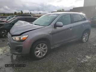 2015 Mitsubishi Outlander ES with VIN 4A4AP3AU7FE050563, listed as a Copart auction lot 82462665 with 119,238 mi miles and Clean title. Bid and sale history available at DreamBid. Image 1.