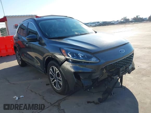✅ 2020 Ford Escape SEL • VIN: 1FMCU0H66LUC39295 • Lot: 43596367. Listed on IAAI with 59,895 mi. Free auction sales archive from the USA and detailed vehicle history report at DreamBid. Image 1.
