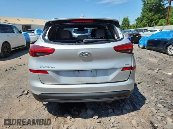 2019 Hyundai Tucson Value with VIN KM8J3CA47KU014032, listed as a Copart auction lot 63592985 with 62,040 mi miles and Salvage title. Bid and sale history available at DreamBid. Image 6.
