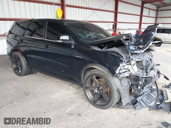 2021 Dodge Durango R/T with VIN 1C4SDJCT9MC547152, listed as a IAAI auction lot 42919209 with 82,920 mi miles and . Bid and sale history available at DreamBid. Image 1.