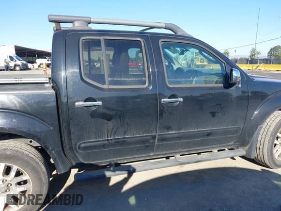 ✅ 2011 Nissan Frontier Pro-4X • VIN: 1N6AD0EV7BC440969 • Lot: 42968301. Listed on IAAI with 165,210 mi. Free auction sales archive from the USA and detailed vehicle history report at DreamBid. Image 13.