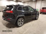 ✅ 2015 Jeep Cherokee Trailhawk • VIN: 1C4PJMBS7FW650340 • Lot: 43755791. Listed on IAAI with 129,855 mi. Free auction sales archive from the USA and detailed vehicle history report at DreamBid. Image 4.