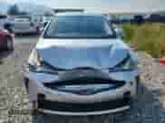 2021 Toyota Prius L Eco with VIN JTDKAMFU1M3150517, listed as a Copart auction lot 70697765 with 107,800 mi miles and Salvage title. Bid and sale history available at DreamBid. Image 5.