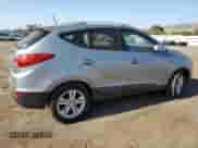 2011 Hyundai Tucson GLS z VIN KM8JU3ACXBU279726, wystawiony jako Copart lot #69819994 z przebiegiem 172 688 mil mil oraz Szkoda całkowita • Salvage title. Historia ofert i sprzedaży dostępna na DreamBid. Obrazek 3.