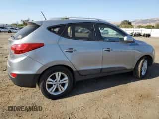 2011 Hyundai Tucson GLS z VIN KM8JU3ACXBU279726, wystawiony jako Copart lot #69819994 z przebiegiem 172 688 mil mil oraz Szkoda całkowita • Salvage title. Historia ofert i sprzedaży dostępna na DreamBid. Obrazek 3.
