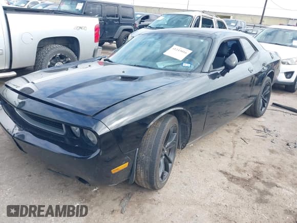 ✅ 2013 Dodge Challenger SXT • VIN: 2C3CDYAG5DH500642 • Lot: 41243016. Wystawiony na IAAI z przebiegiem 199 136 mil. Bezpłatny archiwum sprzedaży aukcyjnych z USA i szczegółowy raport historii pojazdu na DreamBid. Zdjęcie 17.