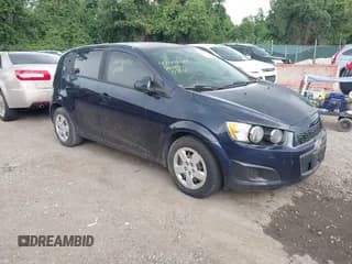 ✅ 2015 Chevrolet Sonic LS • VIN: 1G1JA6SG7F4214749 • Lot: 42646414. Listed on IAAI with 141,879 mi. Free auction sales archive from the USA and detailed vehicle history report at DreamBid. Image 1.