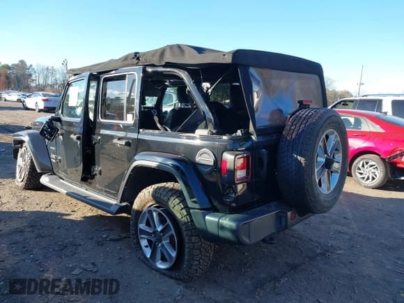 ✅ 2021 Jeep Wrangler Unlimited Sahara • VIN: 1C4HJXEN4MW714133 • Lot: 41241040. Listed on IAAI with 82,247 mi. Free auction sales archive from the USA and detailed vehicle history report at DreamBid. Image 3.