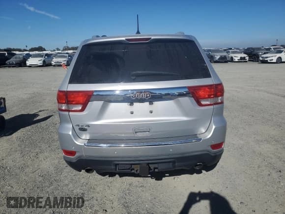 ✅ 2011 Jeep Grand Cherokee Overland • VIN: 1J4RR6GT7BC604866 • Lot: 91003765. Listed on Copart with 128,314 mi. Free auction sales archive from the USA and detailed vehicle history report at DreamBid. Image 6.