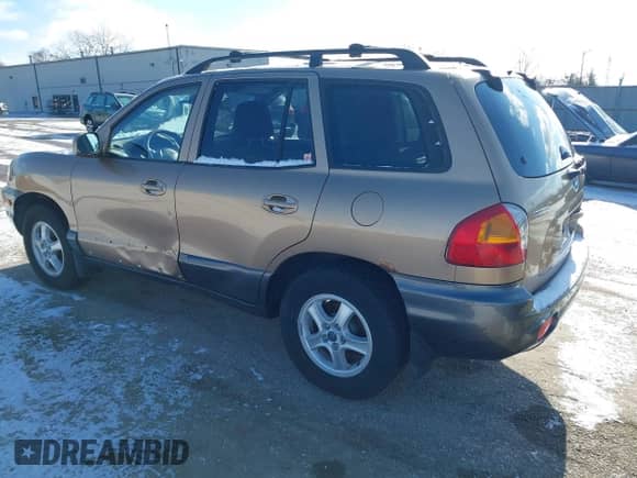 2002 Hyundai Santa Fe GLS z VIN KM8SC73D62U316002, wystawiony jako IAAI lot #41249855 z przebiegiem Nie podano mil oraz . Historia ofert i sprzedaży dostępna na DreamBid. Obrazek 3.