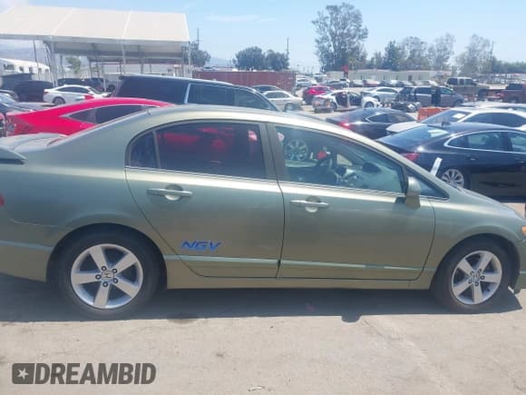 ✅ 2009 Honda Civic GX • VIN: 1HGFA465X9L000358 • Lot: 43065997. Listed on IAAI with 239,893 mi. Free auction sales archive from the USA and detailed vehicle history report at DreamBid. Image 13.
