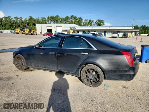 ✅ 2015 Cadillac CTS Luxury AWD • VIN: 1G6AX5S36F0131014 • Lot: 64573775. Listed on Copart with 121,160 mi. Free auction sales archive from the USA and detailed vehicle history report at DreamBid. Image 2.