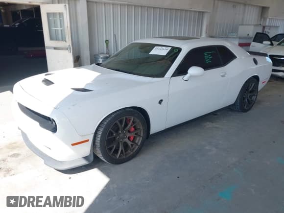 ✅ 2016 Dodge Challenger SRT Hellcat • VIN: 2C3CDZC99GH200224 • Lot: 43442618. Wystawiony na IAAI z przebiegiem 56 715 mil. Bezpłatny archiwum sprzedaży aukcyjnych z USA i szczegółowy raport historii pojazdu na DreamBid. Zdjęcie 2.