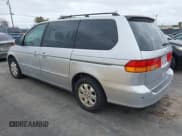 ✅ 2003 Honda Odyssey EX-L • VIN: 5FNRL18773B062409 • Лот: 43748238. Опубликован ранее на IAAI с пробегом 163 959 миль. Бесплатный доступ к архиву аукционных продаж из США и подробный отчёт об истории автомобиля на DreamBid. Изображение 3.