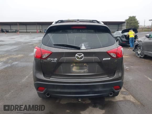 ✅ 2016 Mazda CX-5 Grand Touring • VIN: JM3KE4DY2G0763608 • Lot: 43864275. Wystawiony na IAAI z przebiegiem 95 452 mil. Bezpłatny archiwum sprzedaży aukcyjnych z USA i szczegółowy raport historii pojazdu na DreamBid. Zdjęcie 17.